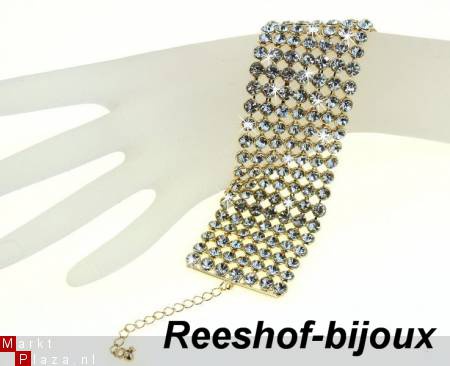 Schitterende brede goudvergulde armband met veel Strass