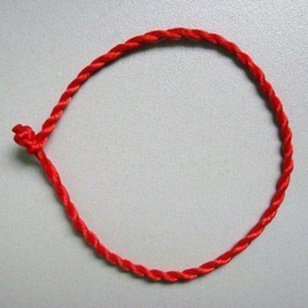 geluks ambandje rood koord armband red lucky bracelet - nr. 1