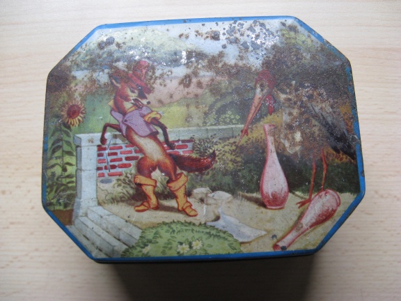 Antiek 8 hoekig blik met frans/nederlandse tekstjes...de Vos en de Ooievaar ca. 1920/30! - nr. 1