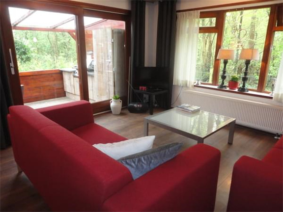Vakantiehuisje in Doornspijk op Bospark met veranda - Afbeelding 7