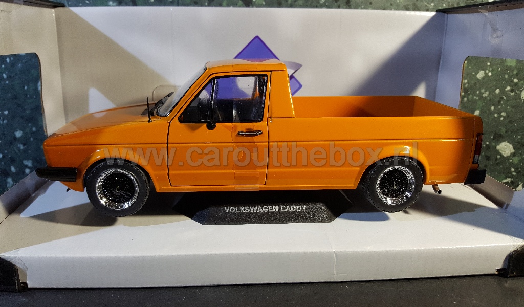 Volkswagen Caddy pick-up oranje 1:18 Solido - nr. 1